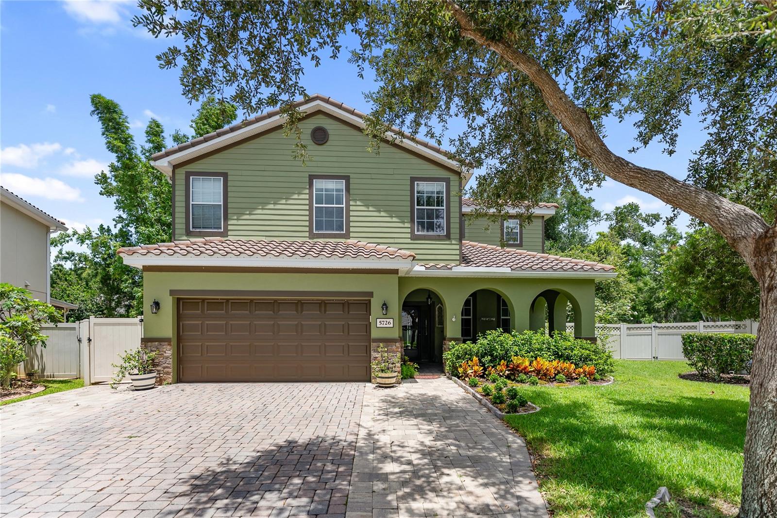 One-of-a Kind Multi-Generational Oasis in the Heart of Sarasota! Welcome to 5726 Aaron Ct, where luxury, space and versatility meet in this show-stopping 6 Bedroom, 5.5 Bathroom Pool and Spa home featuring an extraordinary 750 sqft addition. The attached addition includes its own bedroom, a full bathroom, living area, kitchenette, air conditioner, washer/dryer connection and private entry - ideal for multi-generational living, private guest quarters, or an income producing potential! Tucked away on a peaceful corner lot with very minimal HOA and no CDD, this upgraded retreat offers a thoughtfully designed layout with high ceilings, dual living areas and a seamless flow for entertaining. The chef's kitchen features quartz countertops, stainless steel appliances, a gas range, custom cabinetry and a large center island. Additional highlights of the home include your very own English library, an oversized pavered driveway, a corner lot with a spacious backyard and brand-new carpets in the bedrooms. The addition includes a Generac generator ensuring you will always have power when needed. Step outside into your backyard paradise and you'll find a sizeable heated, saltwater pool with spillover spa, within an expansive screened-in lanai and cedar planked covered ceiling offering warmth, charm and an elevated outdoor living experience. Whether you're hosting gatherings or enjoying a quiet evening, the ambiance is truly unforgettable. Prime Sarasota location, you're only minutes away from University Town Center (UTC) with world class shopping and dining; the arts and entertainment of Downtown Sarasota; I-75; Nathan Benderson Park and the soon to be open MOTE Marine Aquarium; as well as the unforgettable and world-renowned crystal clear water- beaches that the Sun Coast is famous for. This is more than a home, it is a Must See and an opportunity to live, host and invest in one of Sarasota's most versatile properties on the market today! Schedule your private tour before it's too late!