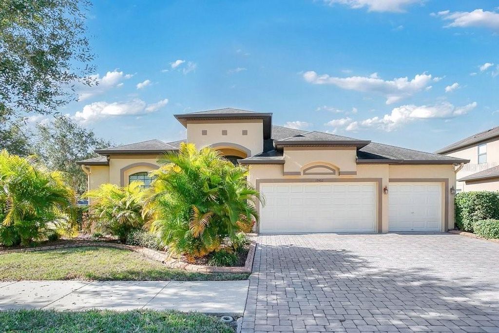 Photo of 19402 Sweet Grass Way, Lutz, FL 33558 (MLS # O6372962)