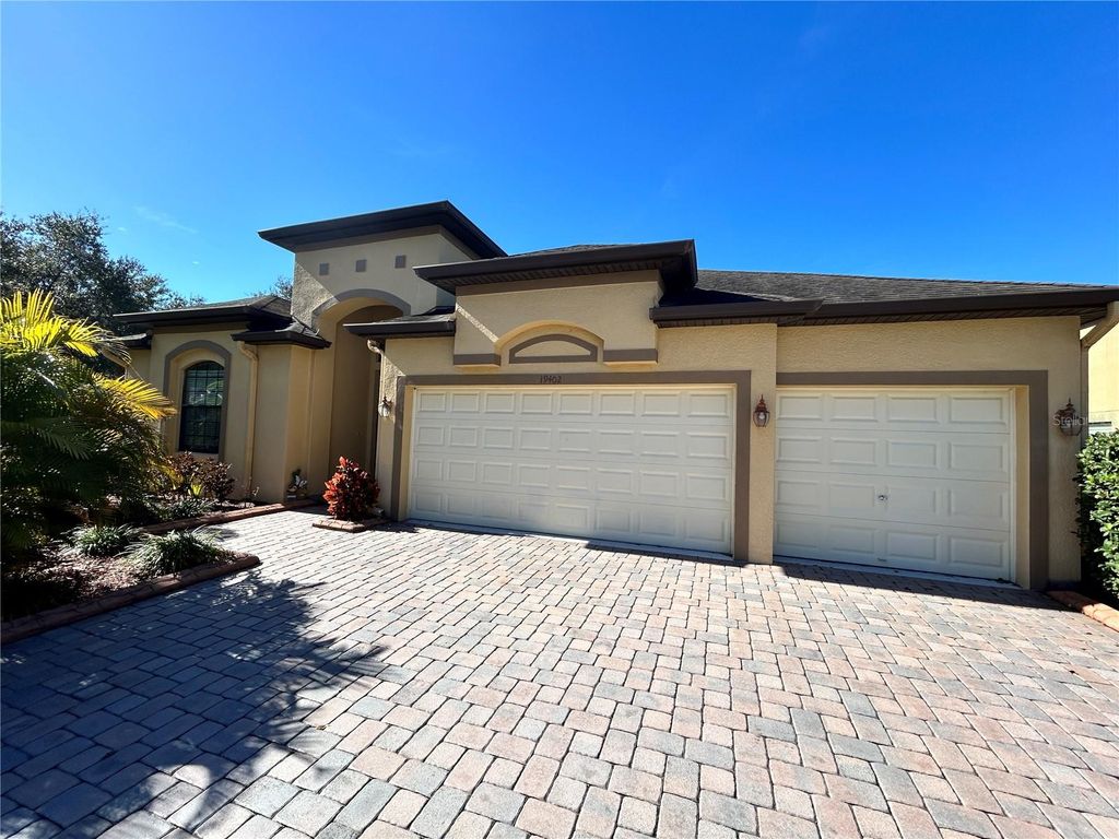 Photo of 19402 Sweet Grass Way, Lutz, FL 33558 (MLS # O6372962)