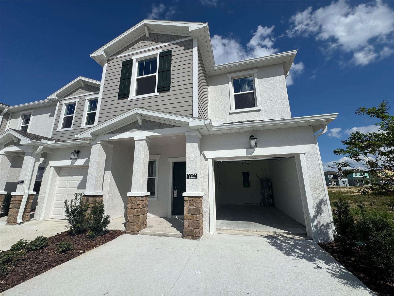 Discover the perfect blend of comfort and convenience in this beautiful end-unit townhouse, ideally located in the sought-after Clermont Olympus area. Offering 3 spacious bedrooms and 2.5 bathrooms, this home features a thoughtfully designed open-concept floor plan, creating a bright and inviting atmosphere from the moment you walk in.
The modern kitchen comes fully equipped with stainless steel appliances — including refrigerator, range, microwave, and dishwasher — making it both stylish and functional. A convenient washer and dryer are also included, ensuring everyday comfort.
Upstairs, the master suite offers a true retreat with a generous walk-in closet and a dual vanity bathroom. Two additional bedrooms share a full bath, providing plenty of space for family, guests, or even a home office. On the first floor, a half-bath adds an extra touch of convenience for entertaining.
Being an end-unit, this property enjoys extra privacy, additional windows for more natural light, and a slightly larger lot than most townhomes, enhancing both comfort and value.
With all appliances included and the home move-in ready, this townhouse is a rare opportunity to enjoy modern living in one of Clermont’s most dynamic growth areas.