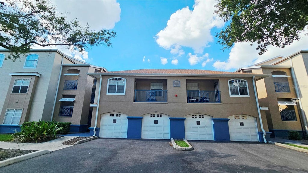 Photo of 7330 Westpointe Boulevard #412, Orlando, FL 32835 (MLS # O6447442)