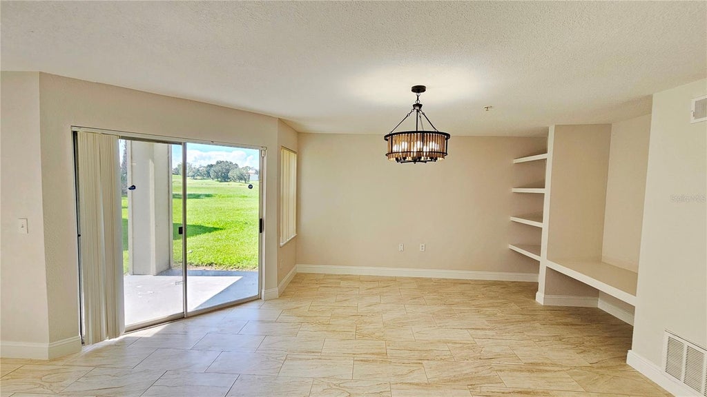 Photo of 7330 Westpointe Boulevard #412, Orlando, FL 32835 (MLS # O6447442)