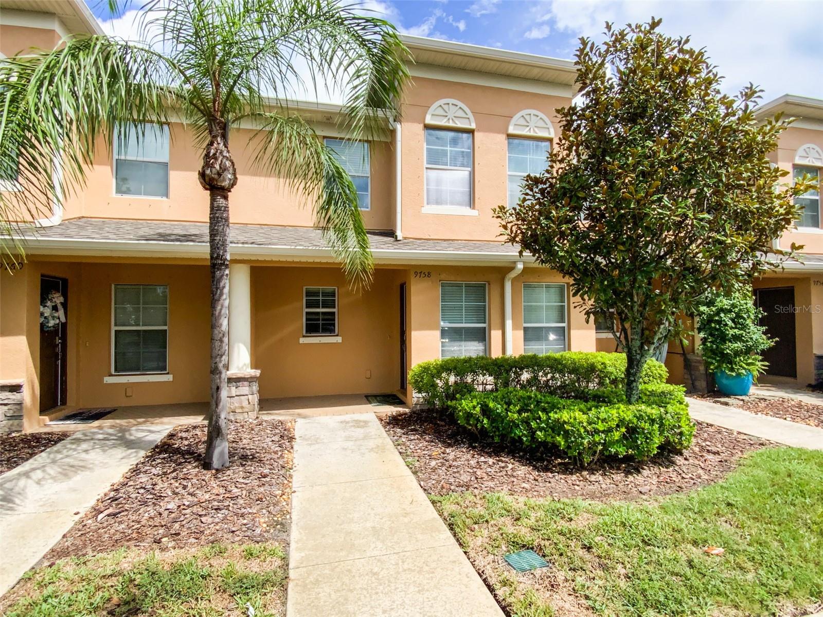 Now available....this spacious 2-bedroom, 2.5-bathroom townhome in the desirable Thousand Oaks community of Trinity. The kitchen is beautifully designed with granite countertops, sleek-looking cabinets, stainless steel appliances, a double sink, and ample cabinet space. There is a pass-through opening from the kitchen to the dining room, making it easy for those family holiday get-togethers. The dining room is a nice size with plenty of room for a large table. Off the family room, step outside to enjoy your private partially-covered paver patio, perfect for morning coffee or evening relaxation. The home also includes a dedicated laundry closet with a full-size washer and dryer, and a large exterior storage closet, perfect for all your beach toys and tools. Upstairs, the master bedroom features its own private ensuite bathroom and a closet. Also, a separate bonus room that is perfectly set up for an office, nursery, home gym, or game room. With building insurance, roof maintenance, sewer, trash, and landscaping all covered by the HOA, you can enjoy a low-maintenance lifestyle while still having private space to call your own. Located just minutes from TOP-rated schools, YMCA, shopping, dining, and parks, and just minutes from the Suncoast Parkway and I-75. This townhome offers the best of Trinity living. Don’t miss out—schedule your showing today!
