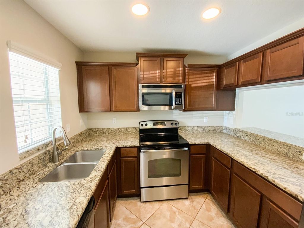 Photo of 9758 Trumpet Vine Loop, Trinity, FL 34655 (MLS # TB8421355)