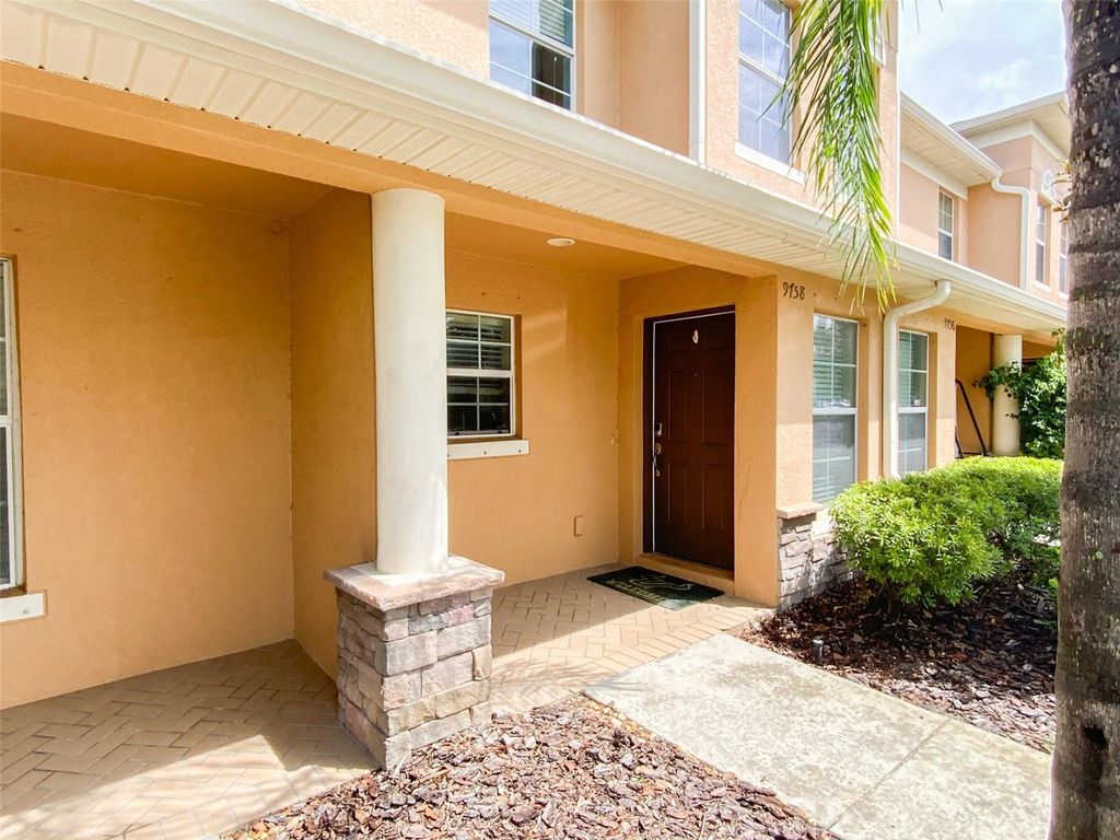 Photo of 9758 Trumpet Vine Loop, Trinity, FL 34655 (MLS # TB8421355)