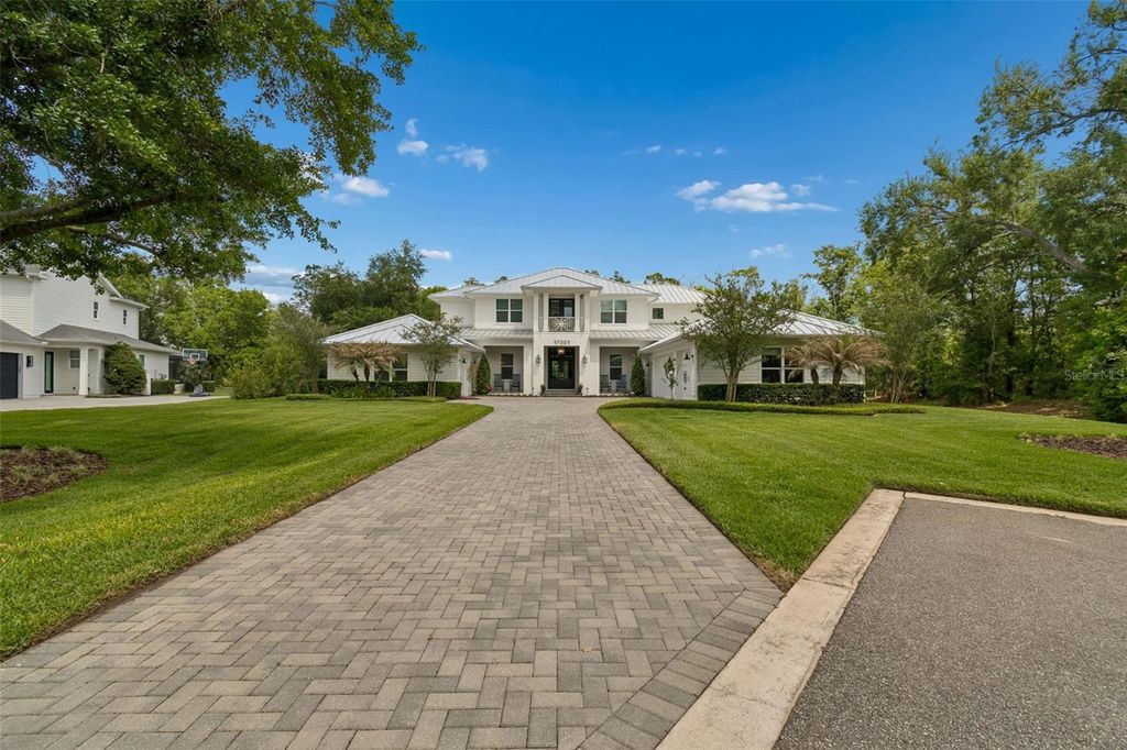 Photo of 17001 Midas Lane, Lutz, FL 33549 (MLS # TB8492439)