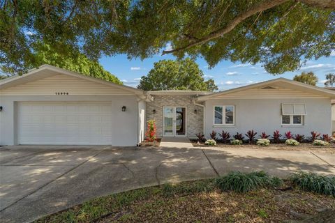 Photo of 12946 88th Avenue, Seminole, FL 33776 (MLS # TB8456761)