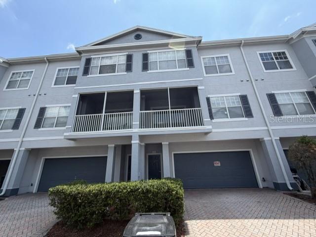 Photo of 2550 NE Grand Central Pkwy Parkways #05, Orlando, FL 32839 (MLS # O6426649)