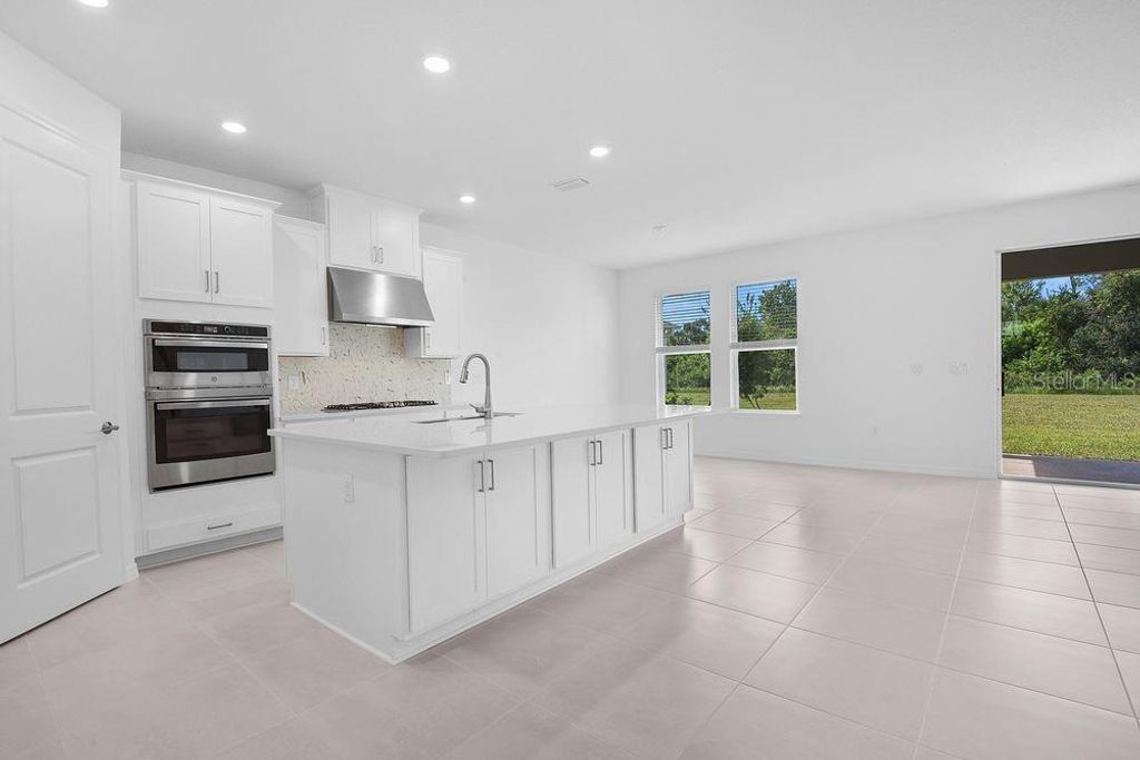 Photo of 858 Junonia Boulevard, New Smyrna Beach, FL 32168 (MLS # O6340656)