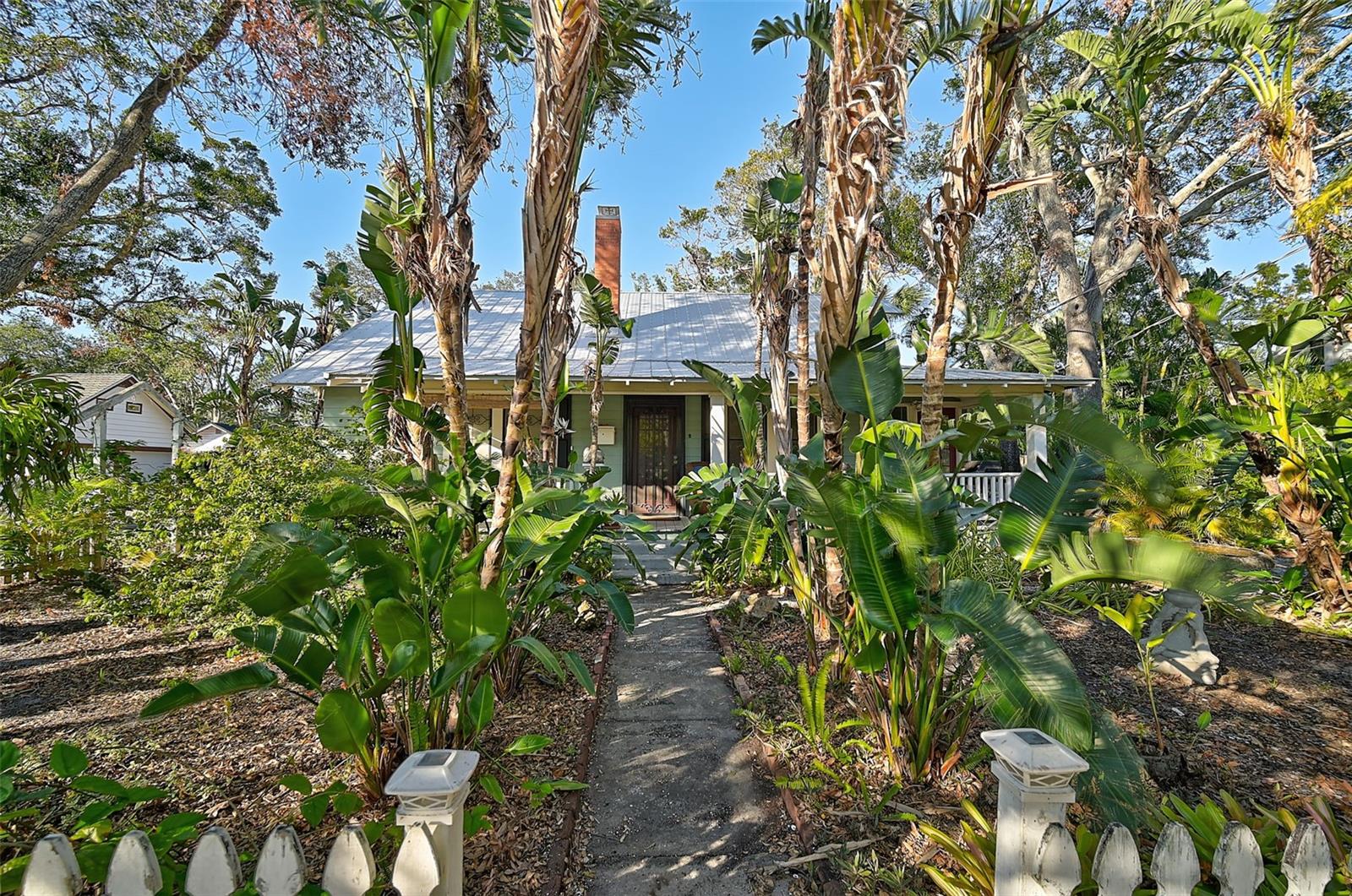 INVESTOR ALERT! This opportunity does not come along often! Located in one of the most charming neighborhoods in DOWTOWN SARASOTA! Gillespie Park is within walking distance to all that Downtown has to offer. A plethora of shopping/dining options and a short distance to Bayfront Park, Marina Jack, Main St., Van Wezel, the Airport and much more! This parcel includes a 2/2 main home plus a studio apartment over the main home with private entrance - endless opportunities await! Both the primary home and studio offer classic charm, including a brick fireplace in the main home, front porch, original hardwood flooring, Florida landscape, and more. New Metal Roof in 2020! Outside is a tropical oasis with lush landscaping, bamboo and great character. Zoned DTN. Great corner lot with potential for redevelopment now/in the future! Keep the current structures or build new! Purchase with the next door property (1677 4th) and you have .36 of an acre in Downtown Sarasota! Prime location minutes to everything. Reach out today for more information on this incredible opportunity and schedule a time to see for yourself!