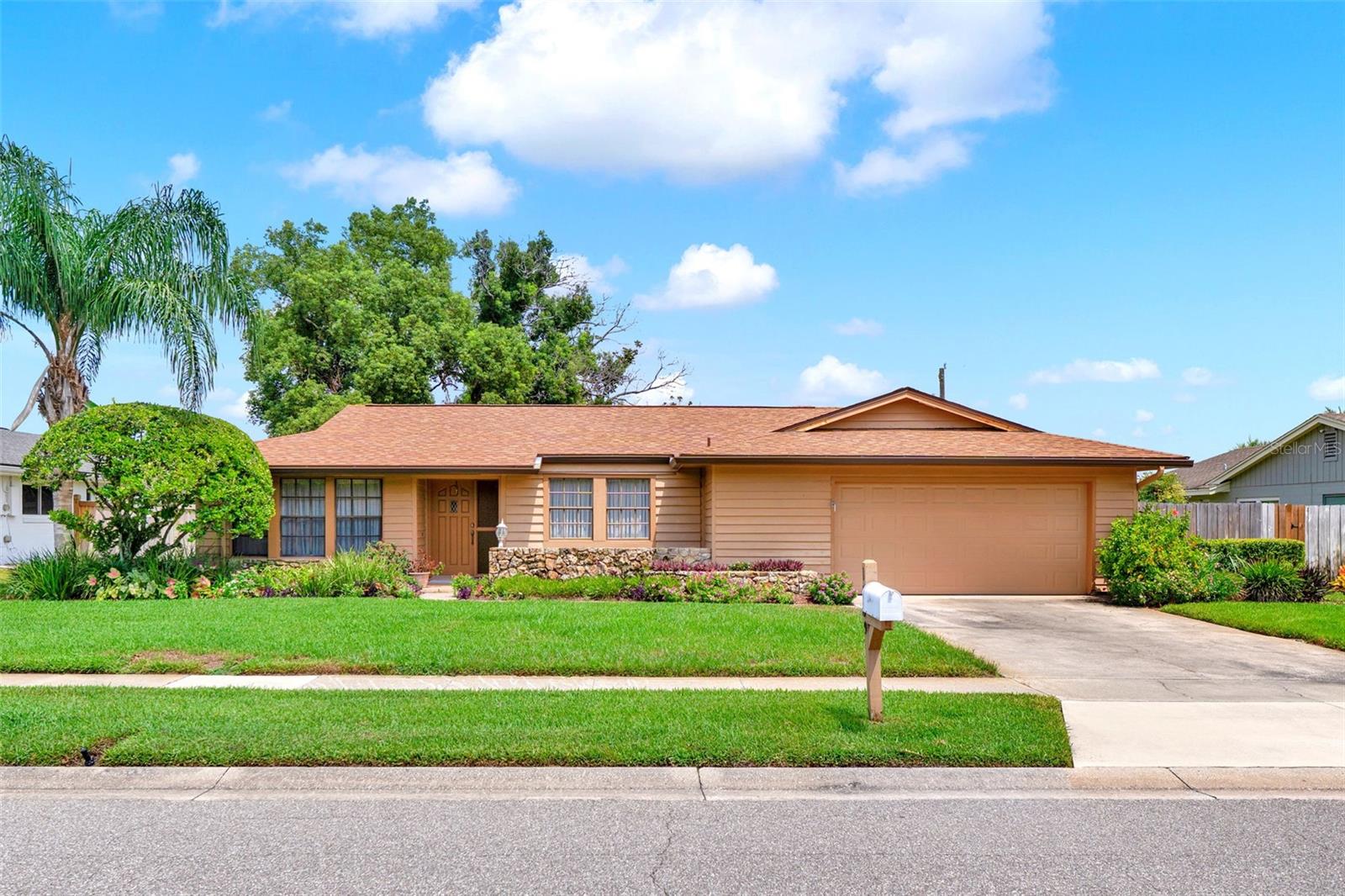Welcome to 1009 Woodall Dr, Altamonte Springs, A Well-Maintained One-Owner Home! Located in the heart of Altamonte Springs and zoned for top-rated Seminole County schools, this beautifully cared-for home is ready for its next chapter! Major Update Just Completed: BRAND NEW ROOF Just installed August 2025! Step into a lushly landscaped oasis, with vibrant greenery and colorful blooms surrounding both the front and back yards. The pool is large and great for soaking up the Florida Sun! The fenced backyard provides plenty of space for pets, play, or gardening. Whether you're hosting a pool party or enjoying a quiet morning coffee, the oversized screened lanai is the perfect Florida retreat. Inside, the home offers a spacious and versatile layout: Formal dining room and a separate living room, ideal for entertaining or easily convertible into a home office. The open-concept kitchen overlooks the family room, creating a welcoming space for gatherings – truly the heart of the home! The family room features a cozy wood-burning fireplace and direct access to the large covered lanai. Enjoy a split-bedroom floor plan, offering privacy for family and guests. The primary suite is generously sized with its own private access to the lanai and pool area. Approx. 20 minutes to Downtown Orlando. Easy access to beaches and theme parks. Minutes to Costco, Altamonte Mall, and everyday conveniences. Enjoy nearby Cranes Roost Park, Wekiva Springs, and scenic nature trails. Don’t miss this opportunity to own a lovingly maintained home in a highly sought-after area. Schedule your private tour today and experience the best of Florida living!