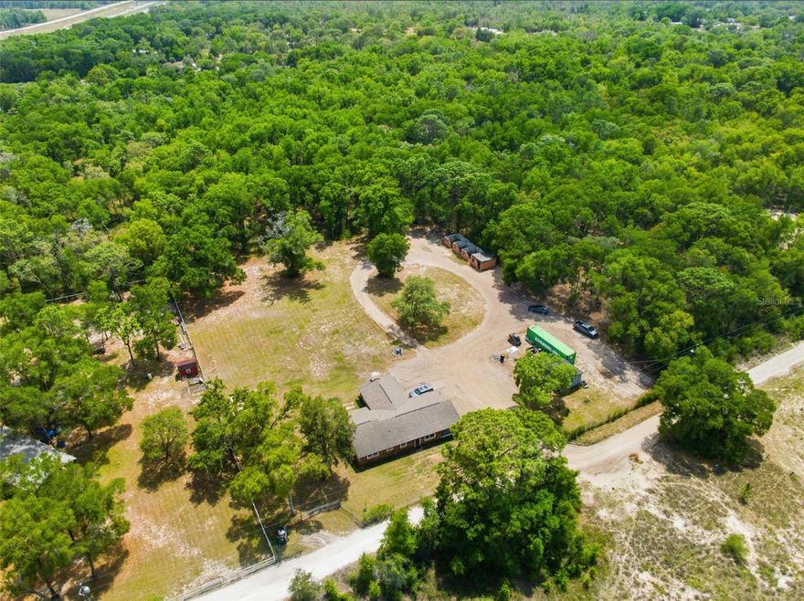 Welcome to your private retreat where modern luxury meets country living, privacy, and cutting-edge smart living. This beautifully updated 3-bedroom, 2-bathroom block home offers over 2,000 square feet of elegant living space, perfectly situated on nearly 2 acres of usable land.
Step inside to discover a thoughtfully upgraded interior featuring marble-style tile flooring throughout, sleek quartz countertops, tray ceilings, and crown molding that elevate every space. The updated bathrooms provide a clean, modern feel, while the dedicated laundry room—complete with a washer/dryer combo—also features a separate entrance, making it ideal for easy clean-up after working outdoors, with animals, or in the garden.
One of the standout features of this home is the fully integrated ELAN whole-house system, valued at over $100k includes TVs and security cameras! This high-end smart home technology allows you to control lighting, built-in surround sound, TVs, and a comprehensive security system with cameras—all seamlessly from your device. Whether you're hosting guests or enjoying a quiet evening, the ambiance and convenience are unmatched.
Outdoors, the property is just as impressive. Enjoy peaceful mornings on the screened porch overlooking your expansive land, complete with masonry horse stalls, a garden greenhouse, and a storage shed for added functionality. Major systems up to date including roof, septic system, well, and a brand water softener—providing both comfort and peace of mind. HVAC 2020. NO HOA/CDD fees, No Flood zone! Close proximity to shops, dining and expressway for a convenient commute to Tampa!
This is a rare opportunity to own a property that combines modern luxury, advanced technology, and acreage living—all in one.