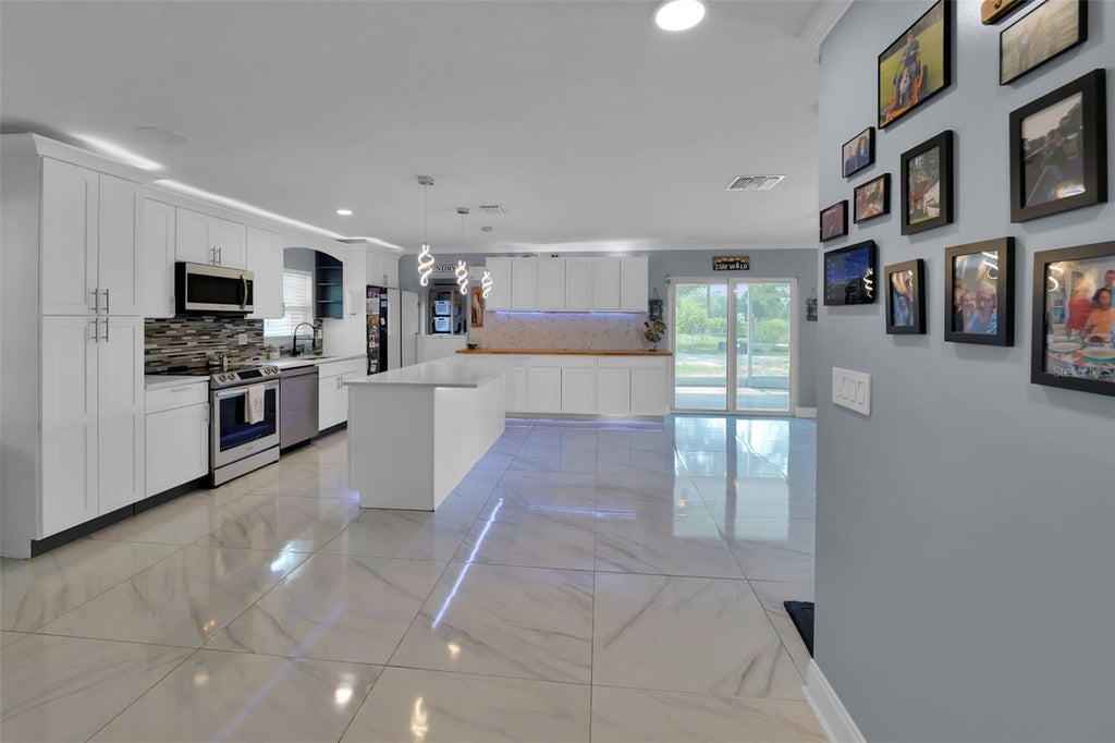 Photo of 16700 Auburndale Lane, Spring Hill, FL 34610 (MLS # TB8499697)