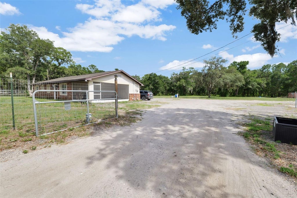 Photo of 16700 Auburndale Lane, Spring Hill, FL 34610 (MLS # TB8499697)