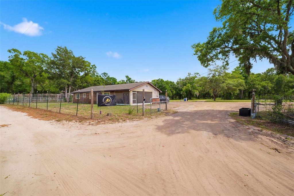 Photo of 16700 Auburndale Lane, Spring Hill, FL 34610 (MLS # TB8499697)