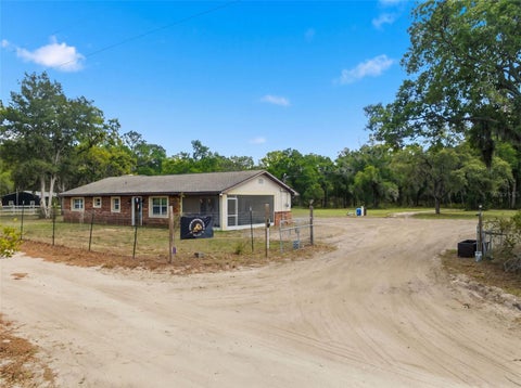 Photo of 16700 Auburndale Lane, Spring Hill, FL 34610 (MLS # TB8499697)