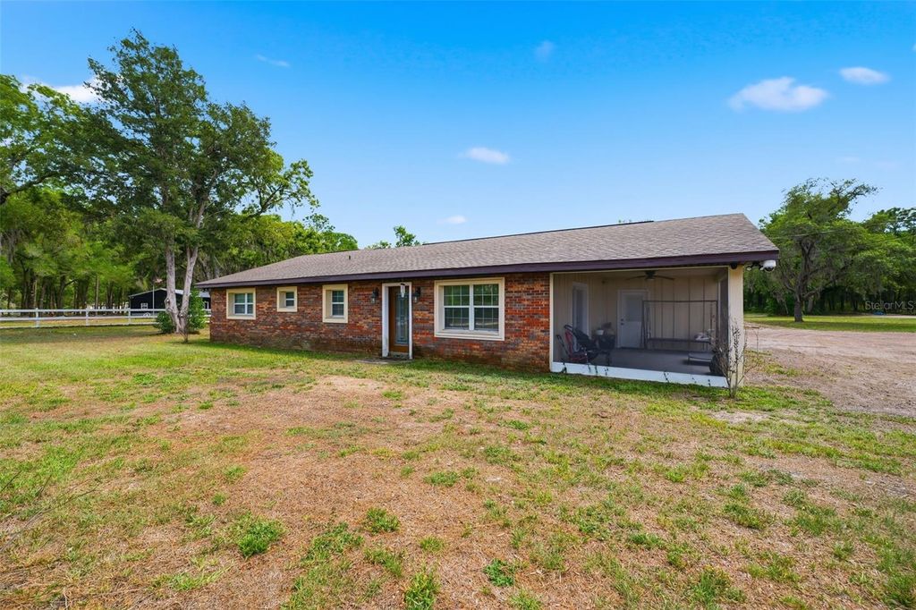 Photo of 16700 Auburndale Lane, Spring Hill, FL 34610 (MLS # TB8499697)