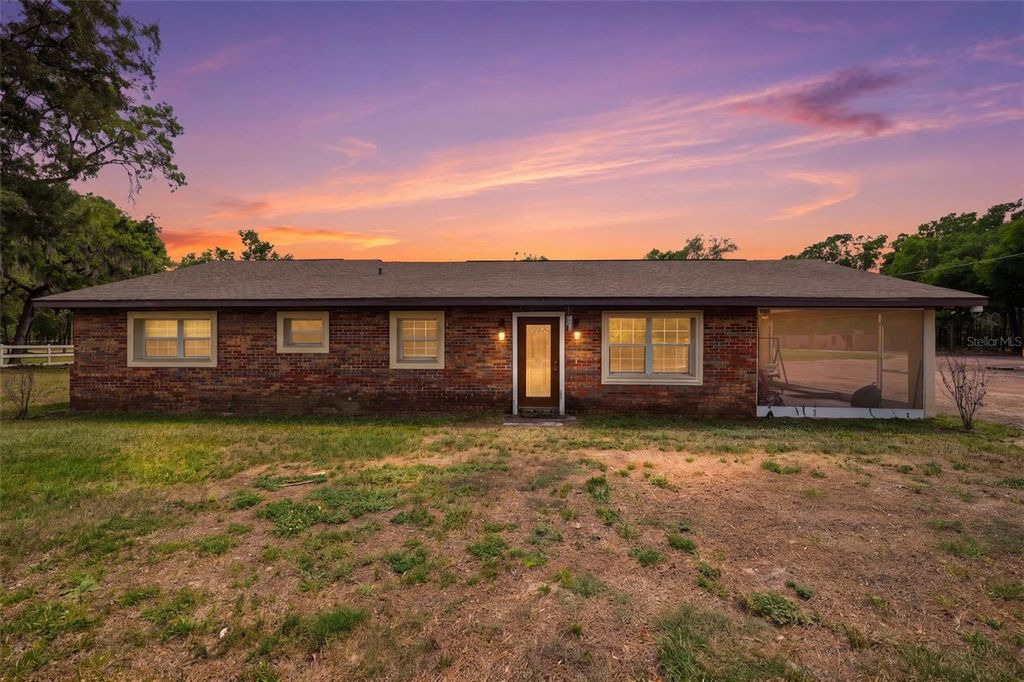 Photo of 16700 Auburndale Lane, Spring Hill, FL 34610 (MLS # TB8499697)