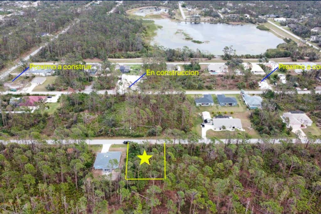Photo of 3125 Tamarind Street, Port Charlotte, FL 33948 (MLS # A4702458)