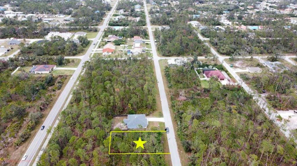 Photo of 3125 Tamarind Street, Port Charlotte, FL 33948 (MLS # A4702458)