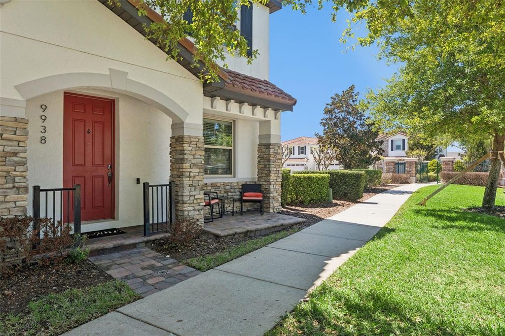 Photo of 9938 Eagle Creek Center Boulevard, Orlando, FL 32832 (MLS # O6394138)