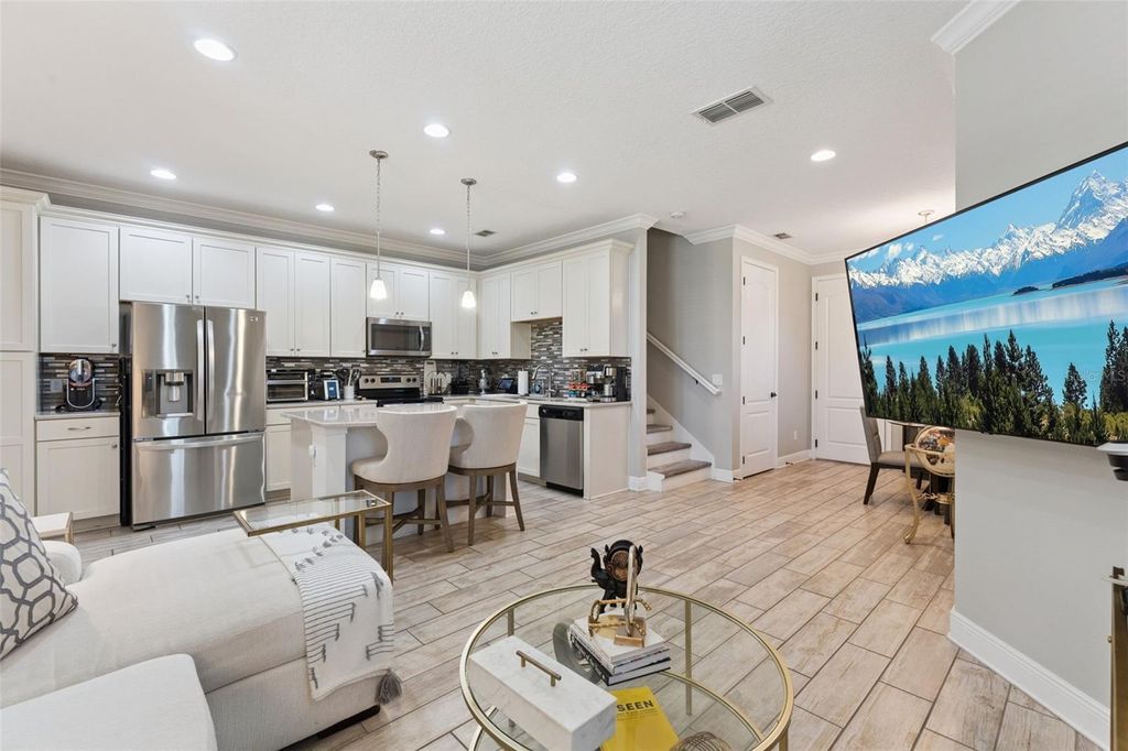 Photo of 9938 Eagle Creek Center Boulevard, Orlando, FL 32832 (MLS # O6394138)