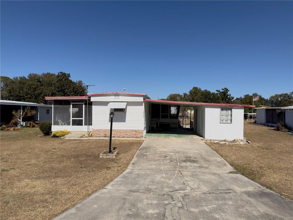 Photo of 12033 Lake Pines Road, Leesburg, FL 34788 (MLS # G5107682)