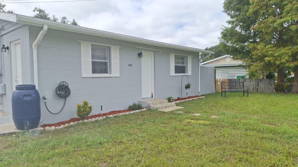 Photo of 607 Lime Avenue, Dundee, FL 33838 (MLS # S5158017)