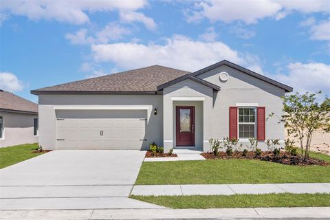 Photo of 1782 White Elephant Loop, Winter Haven, FL 33884 (MLS # O6405643)