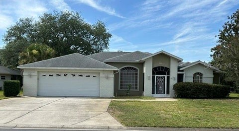 Photo of 9685 Southern Belle Drive, Weeki Wachee, FL 34613 (MLS # OM726764)