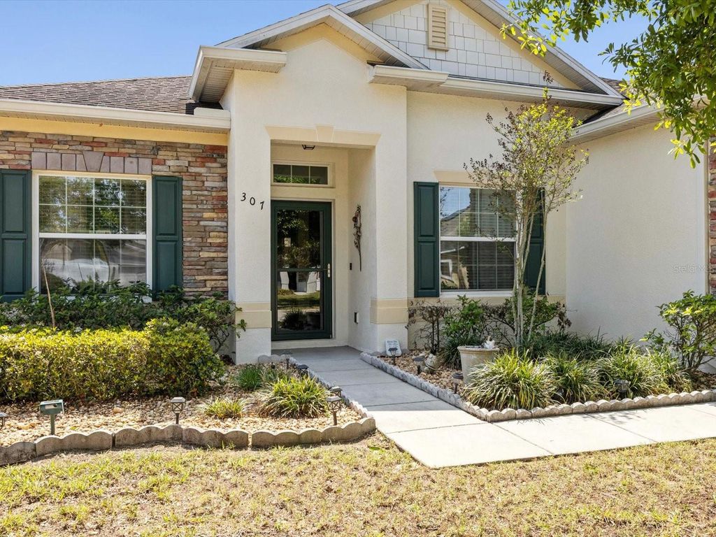 Photo of 307 Gladesdale Street, Haines City, FL 33844 (MLS # O6391928)