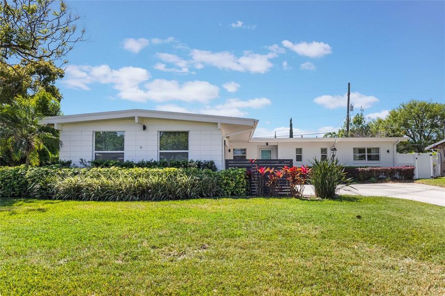 Welcome to refined living in the heart of Dover Shores East! This beautifully maintained 3-bedroom, 2-bathroom pool home offers the perfect blend of comfort and convenience. Inside, you'll find a modern kitchen with stainless steel appliances, granite countertops, and ample cabinet space, along with elegant wood-look laminate flooring throughout. The spacious bedrooms include a primary bedroom with an en-suite and walk-in closet, and every room is equipped with ceiling fans for added comfort. Enjoy the Florida lifestyle with a fully fenced backyard, a sparkling pool, a fire pit, and a covered patio, perfect for outdoor relaxation and entertaining. The home also features a large laundry room with additional cabinetry and storage, and a two-car garage for added convenience. Centrally located, this home is just minutes from Orlando International Airport, Downtown Orlando, and offers easy access to major highways, making commuting a breeze. A/C - 2014, Water heater - 2014, Roof - 2019, partial replumb - 2014, electrical - 2014,  Pool resurface & tile est. 2017, pool pump - est. 2022.