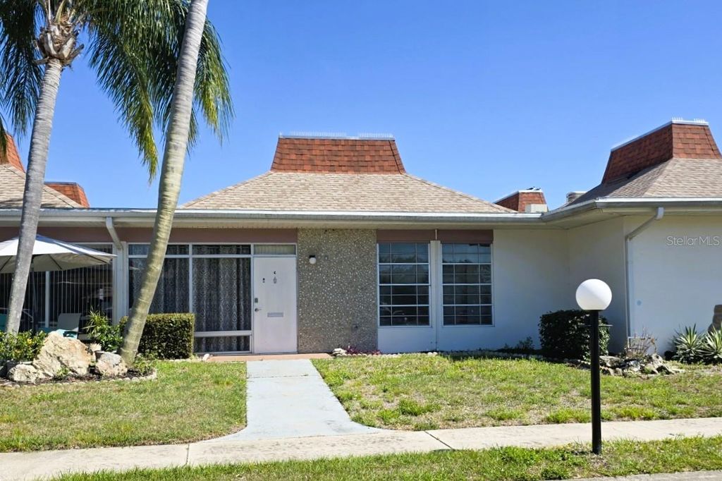 Photo of 4356 Tahitian Gardens Circle #C, Holiday, FL 34691 (MLS # TB8499337)