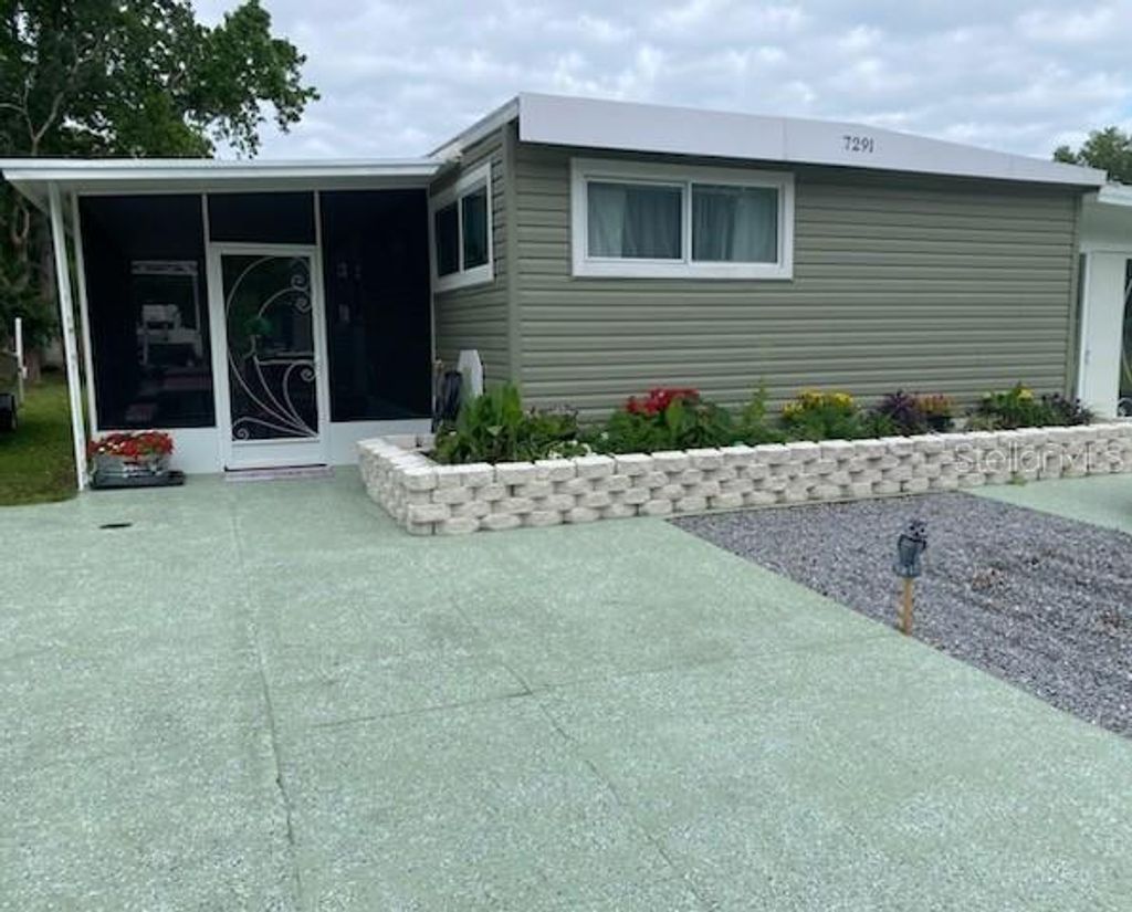 Photo of 7291 Windy Way, Brooksville, FL 34601 (MLS # W7885351)