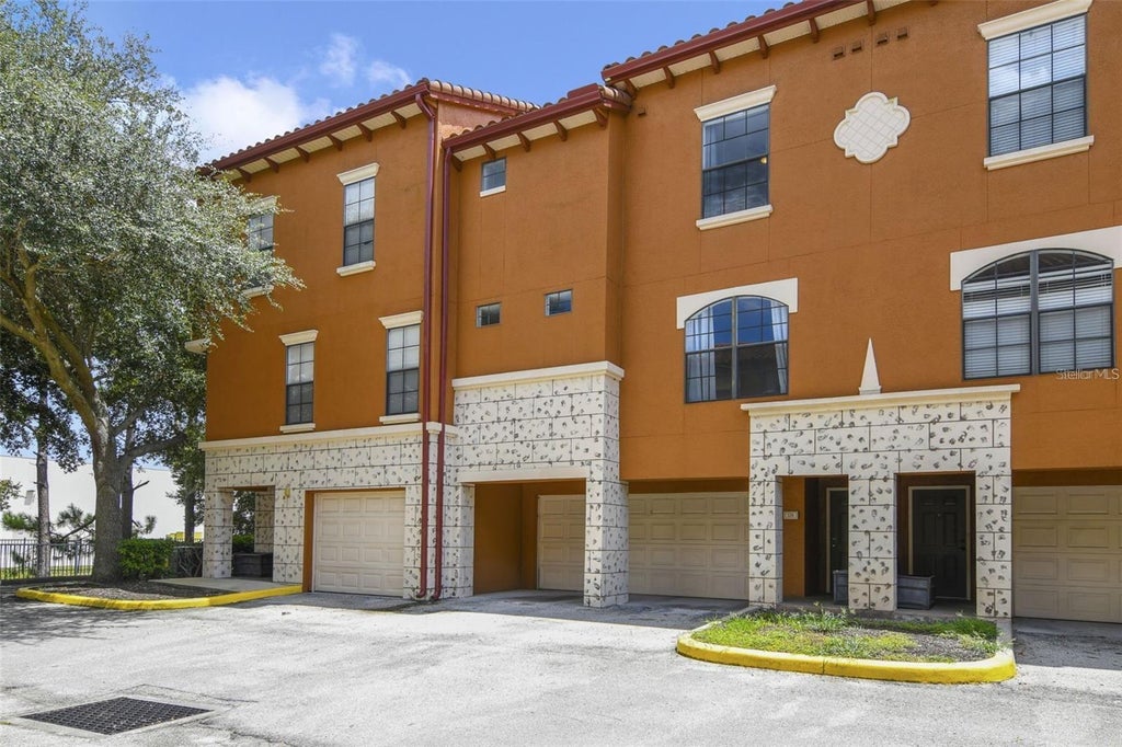 Photo of 6117 Metrowest Boulevard #105, Orlando, FL 32835 (MLS # O6444701)