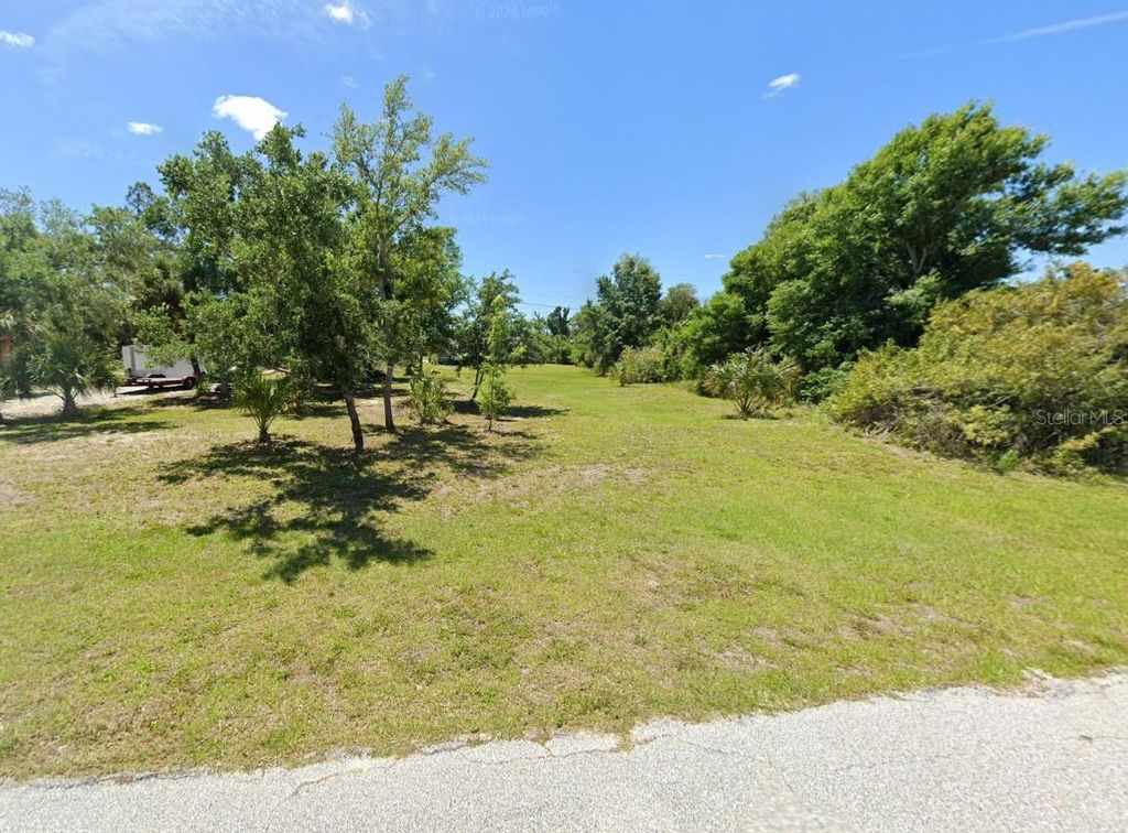 Photo of 11895 Crocus Avenue, Port Charlotte, FL 33981 (MLS # A4630251)