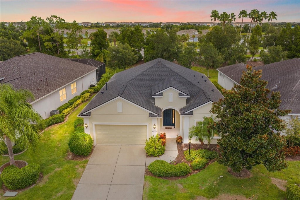 Photo of 4672 Claremont Park Dr, Bradenton, FL 34211 (MLS # A4703326)