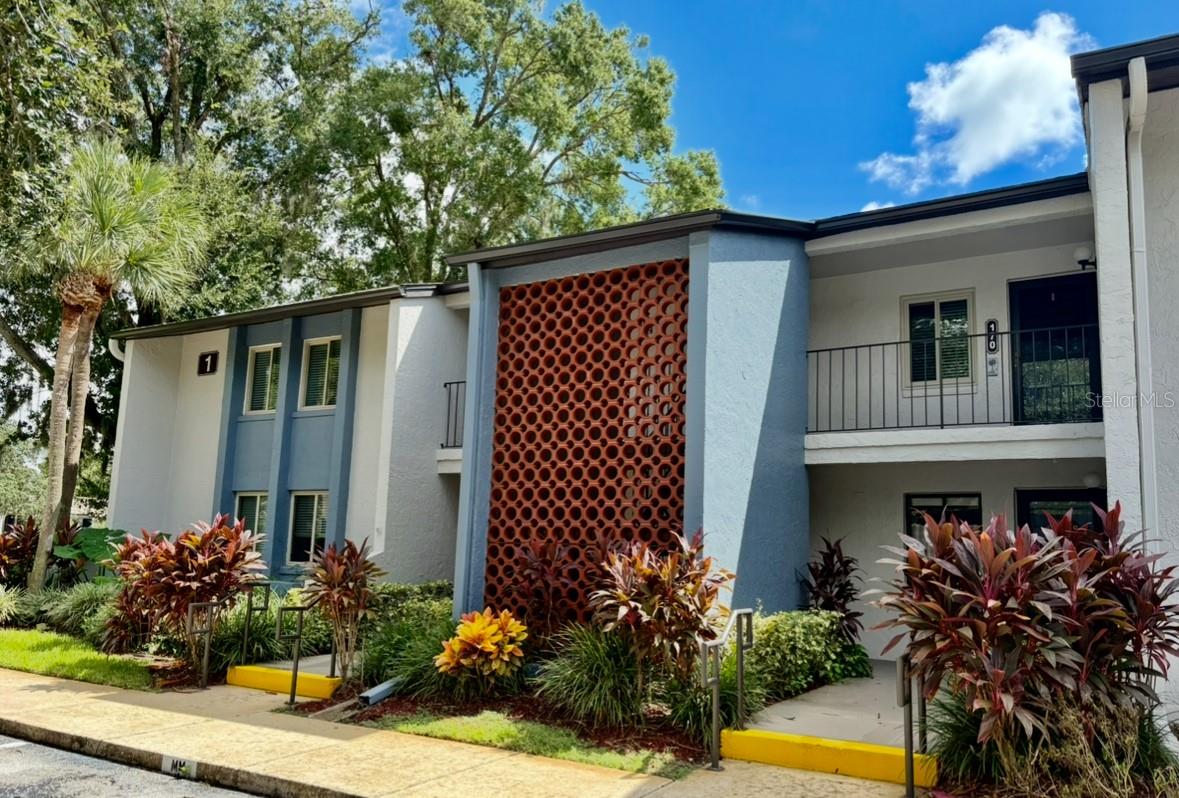 COME AND VIEW THIS LOVELY 2 BEDROOM & 2 FULL BATH CONDO! ON SECOND FLOOR WITH WATER VIEW. Seminole County'd premiere 55+. The warm and inviting ambiance of the dining and living room combo with vaulted ceilings and a gorgeous brick-framed wood-burning fireplace. Sliding doors welcome you to the glass-enclosed porch with a large storage closet, private rear steps entrance and green space views. Enjoy the spectacular! view from Porch and Master Bedroom. The renovated kitchen includes granite countertops and backsplash. All rooms include ceiling fans. All appliances are included, new Washer and Dryer, A/C 2022. Windows installed in 2020 are approved Hurricane resistant. NEW Roof 2023. New plumbing. HOA Fee includes Cable TV and internet. On site Management Office. AMENITIES: Renovated Clubhouse with kitchen, Heated Pool, Multiple Tennis Courts, Pickle Ball, Shuffleboard Court, Car Wash Area, Guest Parking. Located just minutes away from everything and central to All Major Transportation, near the Sun Rail and I-4. 2 Airports, Advent Hospital, plus multiple doctor's offices, Beaches, Bike trails, Across the street you have access to shopping at the Altamonte Springs Mall. Fine Dining and Grocery Stores, Theaters, Cultural and Sports Entertainment, Attractions, Parks Festivals, Fireworks. Come live the good life in Escondido, Peaceful Living in the well-manicured grounds, featuring wonderful garden sidewalks and benches to enjoy the multiple fountain and water features throughout. This beautiful condo is ready for you! Schedule a showing today!