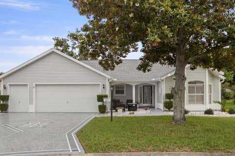 Photo of 603 Lisbon Lane, Lady Lake, FL 32159 (MLS # TB8516490)