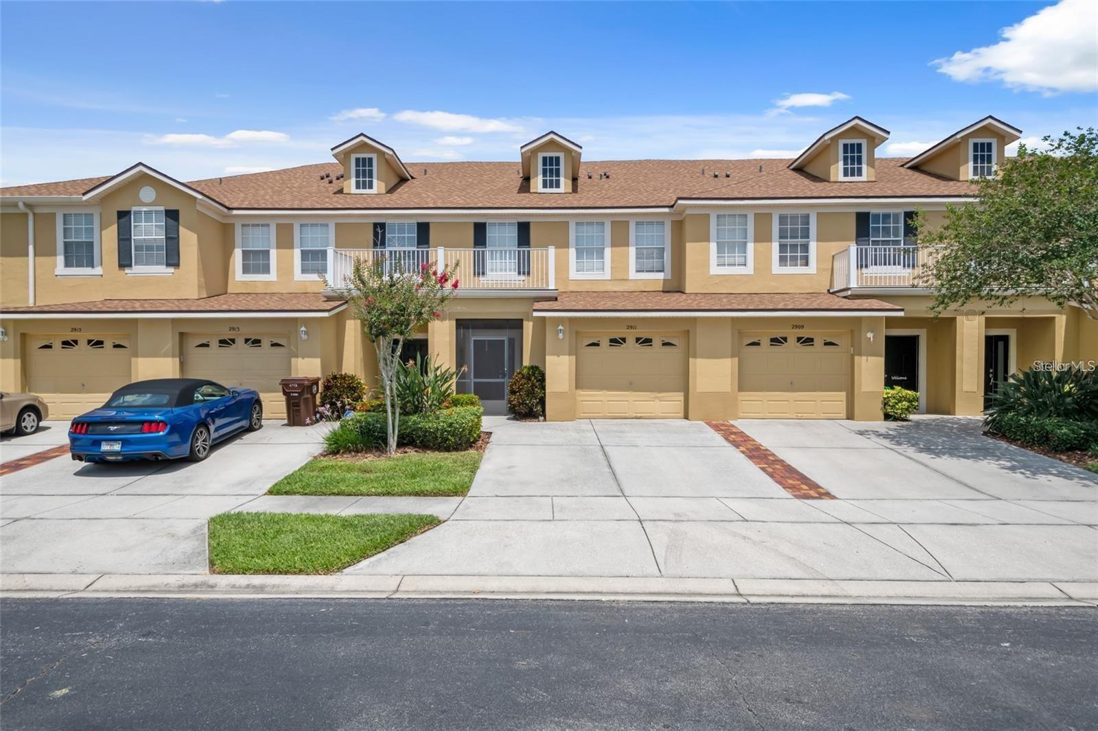 **Excellent Townhome near THE LOOP** Step into this beautifully updated, three-bedroom, two-and-a-half-bath townhome. Located in the sought-after gated community of The Townhomes of Florida Ridge, you'll be less than two miles from The Loop, offering unparalleled access to a variety of shops and dining options. Inside, you'll find a thoughtfully designed open floor plan with porcelain tile and wood-grain plank flooring. The kitchen is a true standout, featuring stunning granite counters, a wine cooler, a butler's pantry, and custom antique cabinets. A spacious, screen-enclosed lanai with a pond view provides a perfect spot to relax. Upstairs, the oversized primary suite also overlooks the pond and includes a separate alcove—ideal for a home office. You'll have no shortage of storage with a huge walk-in closet plus an additional closet, and the en-suite bathroom boasts dual sinks, a walk-in shower, and a garden tub. The upstairs also includes a large laundry room with Samsung washer and dryer. Community amenities include a pool, a playground, and a walking trail around the pond. A one-car garage and two additional parking spaces complete this exceptional property. Schedule your visit today! It's a must-see!