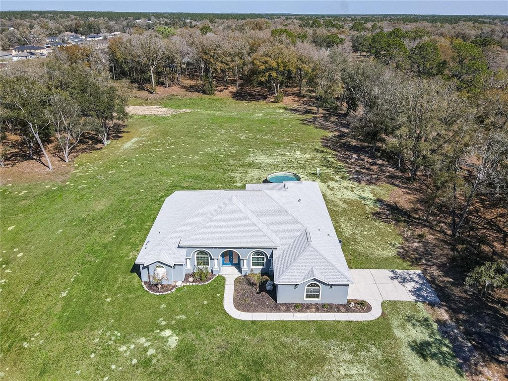 Photo of 10688 SW 129th Terrace Road, Dunnellon, FL 34432 (MLS # O6283822)