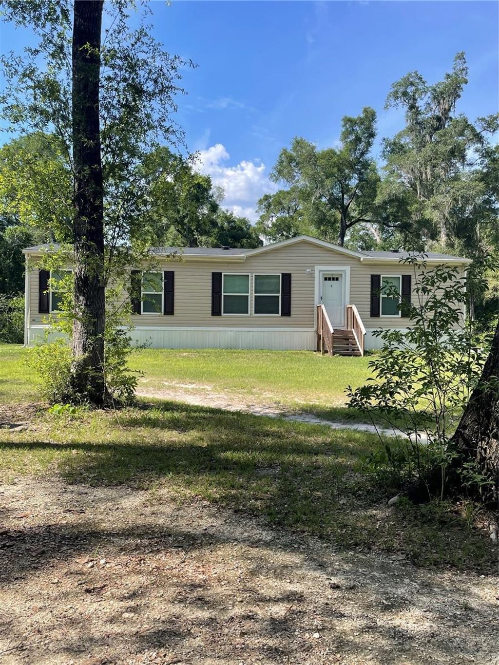Photo of 2006 SE 46th Way, Trenton, FL 32693 (MLS # W7886555)