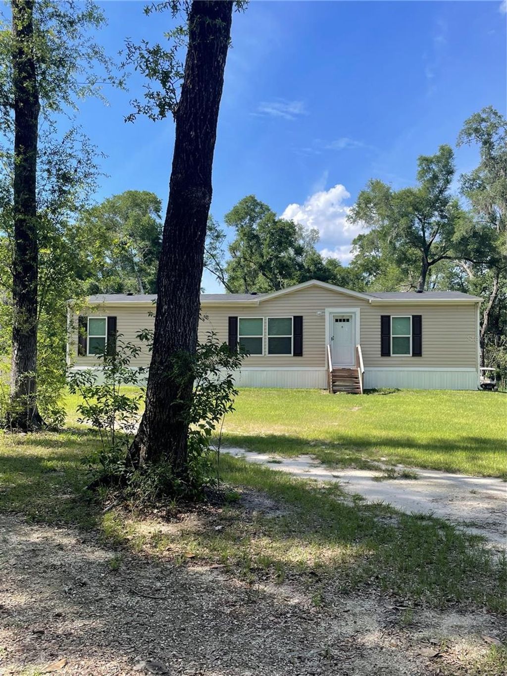 Photo of 2006 SE 46th Way, Trenton, FL 32693 (MLS # W7886555)