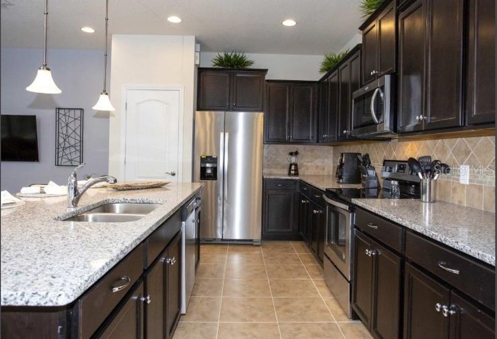 Photo of 8875 Geneve Ct, Kissimmee, FL 34747 (MLS # O6362536)