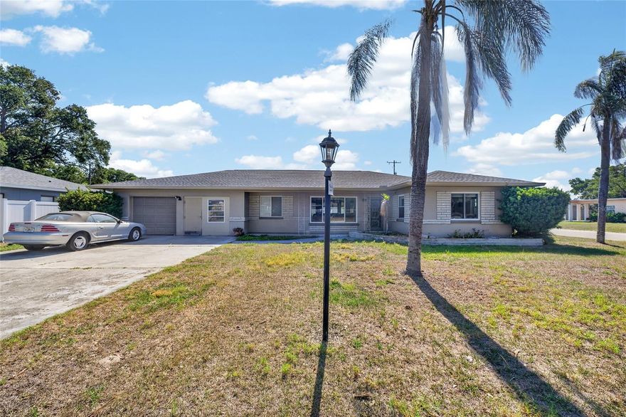 Oversized corner lot + 2025 major upgrades—this Clearwater property stands out.
3BR/2BA with a 2-car garage, large fenced yard, and prime location near beaches and shopping.

Prime Corner Lot Living with Major Upgrades Already Done

Welcome to this beautifully positioned 3-bedroom, 2-bath home at 219 S Saturn Ave, nestled on an oversized corner lot in the heart of Clearwater. This property offers the perfect blend of space, functionality, and peace of mind—with big-ticket upgrades already completed.

Major upgrades already completed include a new roof, A/C system, and ducts.—all updated in 2025—adding long-term value from day one.

Outside is where this home truly shines. The expansive corner lot provides extra breathing room, while the new vinyl privacy fence creates a clean, modern look. A double gate entry on the side makes it easy to store your boat, RV, or trailers.

The spacious backyard offers endless possibilities—whether you’re dreaming of a pool, outdoor kitchen, or simply enjoying Florida evenings on your private patio. There’s plenty of room for entertaining, relaxing, and a fully fenced space for your fur babies to run and play freely.

A 2-car garage adds convenience and flexibility for storage, hobbies, or future upgrades.

Located just minutes from award-winning Gulf beaches, shopping, dining, and major roadways, this home checks all the boxes for both everyday living and long-term investment potential. With major systems already updated, ample lot size, and flexible outdoor space, this property presents an excellent opportunity for primary buyers or investors seeking a property with room to add value.

Properties with this combination of lot size, upgrades, location, and versatility don’t come around often—schedule your showing before it’s gone.