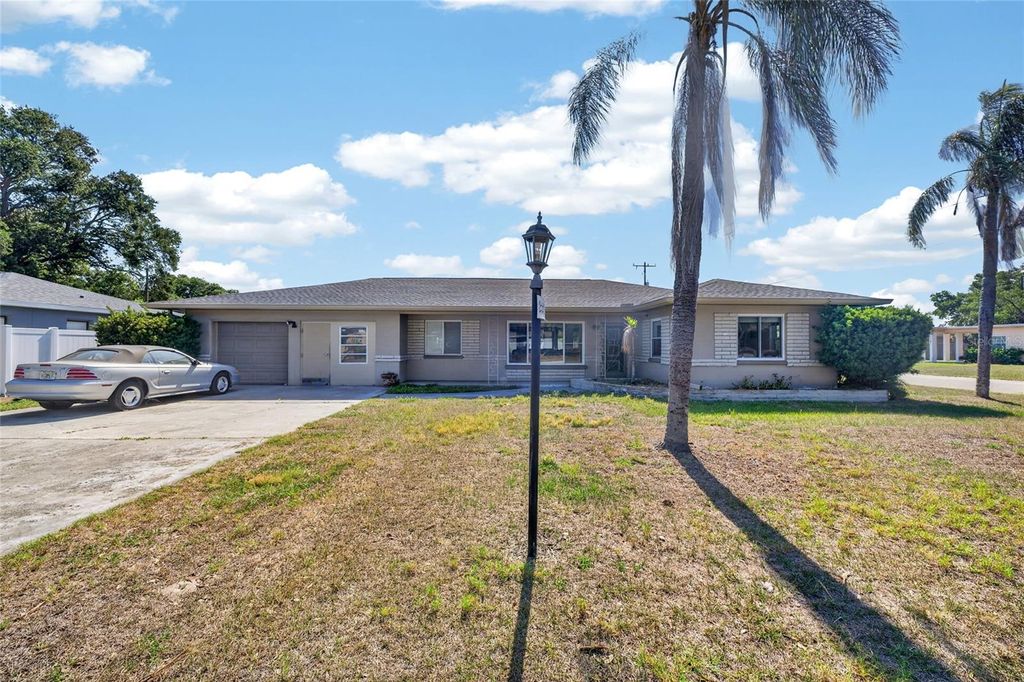 Photo of 219 S Saturn Avenue, Clearwater, FL 33755 (MLS # TB8502508)