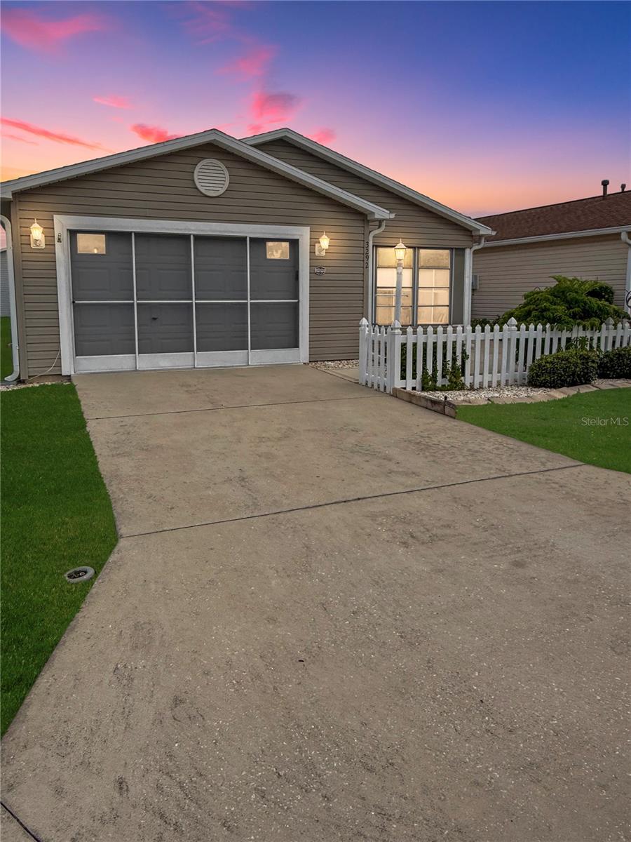 Under contract-accepting backup offers. Lovely Colony model, Patio Villa, FULLY FURNISHED/TURN KEY INCLUDING A GAS GOLF CART!!. You will be so close to shopping, restaurants, entertainment and some of the BEST golf courses and recreation centers in The Villages, as well as the Polo Fields. Low Sumter County Taxes - BOND PAID! Roof replaced in 2018. Hot Water Tank - 2010, A/C~Furnace Replaced in 2014. NO CARPET! Solid surface kitchen countertops. Owner's Suite has en-suite bath and large walk in closet. Plantation shutters in living room / dining room and on the sliding glass door. Large kitchen with pantry. Garage has lots of extra shelves. Newer washing machine. Enclosed lanai. New light fixture at dining room table. Color coated concrete on the walks/patios. Just bring your toothbrush and move right in! This home has been owner occupied and lovingly cared for.