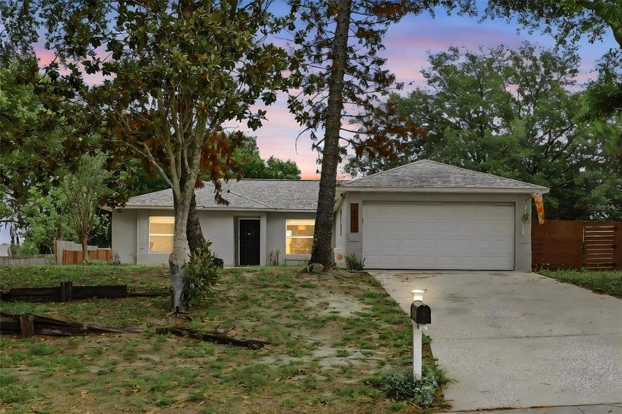 Nestled in the heart of booming Clermont on an expansive .31-acre lot, this beautiful 3 bedroom, 2 bathroom home offers the perfect balance of privacy and open-concept living. The split floorplan centers around a bright, airy family and dining area designed for seamless entertaining. Culinary enthusiasts will love the kitchen’s sleek granite countertops and stainless steel appliances, along with a charming kitchenette surrounded by windows that bathe the space in natural light. The primary suite serves as a private retreat with a generous walk-in closet and a spacious shower, while the two additional bedrooms share a well-appointed second bath with a tub. Step outside to discover a MASSIVE backyard with endless possibilities; whether you envision a lush garden, a premier entertaining space, or a secure area for pets and little ones to play, this oversized lot provides the room to make it a reality.Experience a lifestyle defined by nature and convenience in this prime Clermont location. Just minutes away, Palatlakaha River Park serves as your gateway to the pristine Clermont Chain of Lakes, offering a boat ramp and fishing pier for endless days exploring Lake Susan, Lake Minnehaha, and Lake Louisa. The park itself is a local treasure, complete with scenic nature trails, a playground, and shaded cabanas. For a change of pace, immerse yourself in the charm of Historic Downtown Clermont off the shores of Lake Minneola. This vibrant hub is the "happy place" you’ve been looking for, featuring quaint eateries, local breweries, live music, and a beloved weekly Farmer’s Market.Outdoor enthusiasts will thrive with direct access to the South Lake Bike Trail. This premier 15-mile paved route showcases Central Florida’s rolling hills and connects you to the beautiful waterfront vistas of the Lake Minneola Scenic Trail. For an ambitious Saturday ride, the trail even connects to the West Orange Trail, leading you straight into Downtown Winter Garden.The connectivity here is unmatched: enjoy the peace of a scenic neighborhood while being only 30 minutes from Disney and 40 minutes from Downtown Orlando and the International Airport. With top-tier hospitals, golf courses, and major retail just around the corner—plus quick access to the Florida Turnpike—this location offers the quiet, bucolic lifestyle you’ve been dreaming of without sacrificing modern essentials. ROOF 2020. AC 2019.