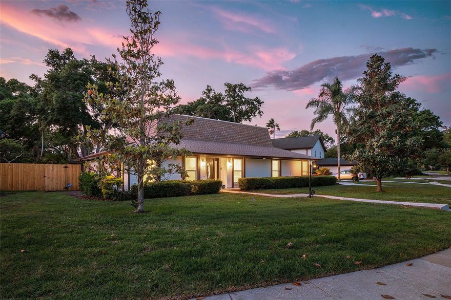 Experience elevated Florida living in this stunning, fully remodeled pool home located in the exclusive Golf Crest Village of Carrollwood Village Phase 1. Situated on a spacious 0.33-acre fenced lot in Flood Zone X, this 4-bedroom, 3-bathroom residence offers beautifully updated living space designed for both comfort and style. Step inside to discover a light-filled interior featuring luxury vinyl plank flooring throughout (no carpet), new two-panel interior doors and trim molding, fresh interior and exterior paint, and upgraded LED lighting and fixtures throughout home. The thoughtfully redesigned chef’s kitchen is the heart of the home, showcasing 42-inch wood cabinetry with crown molding, Calacatta quartz countertops, a waterfall-edge island with seating, single-bowl sink, stainless steel appliances, pot filler, and a sleek hood vent—all accented with elegant champagne bronze finishes. The primary suite is a private retreat, complete with a custom wood accent wall and French doors that open to the paved pool deck and lush backyard. The spa-inspired en-suite bath features dual vanities with quartz countertops, a frameless glass walk-in shower with modern tile, and a spacious walk-in closet. Ideal for entertaining, the home offers a formal living and dining room combination, an open-concept kitchen overlooking the family room, and a large sunroom filled with natural light and views of the beautifully landscaped pool area. The flexible floor plan provides excellent options for multigenerational living, with space that can easily accommodate extended family or guests. Separate living areas and bedroom configurations allow for privacy and independence while still maintaining a connected, functional layout. Major upgrades provide peace of mind, including Simonton double-pane windows, 3 dimensional shingle roof (2025), updated electrical panel, HVAC system, and water heater. Step outside to your private backyard oasis featuring a resurfaced pool (February 2026), freshly sealed pavers (March 2026), new irrigation system, new fencing, and lush St. Augustine sod. The oversized driveway and 2-car garage add convenience and curb appeal. Additional enhancements include new knockdown and orange peel wall texture, a water softener system, and a termite prevention contract. Located in one of Carrollwood’s most sought-after communities, residents enjoy walking-distance access to parks, playgrounds, tennis and pickleball courts, a dog park, skate park, and more. The nearby Carrollwood Country Club offers 27 holes of golf, along with optional social, tennis, or golf memberships, a fitness center, and a heated pool. This move-in-ready home combines modern luxury with an unbeatable location—schedule your private showing today!