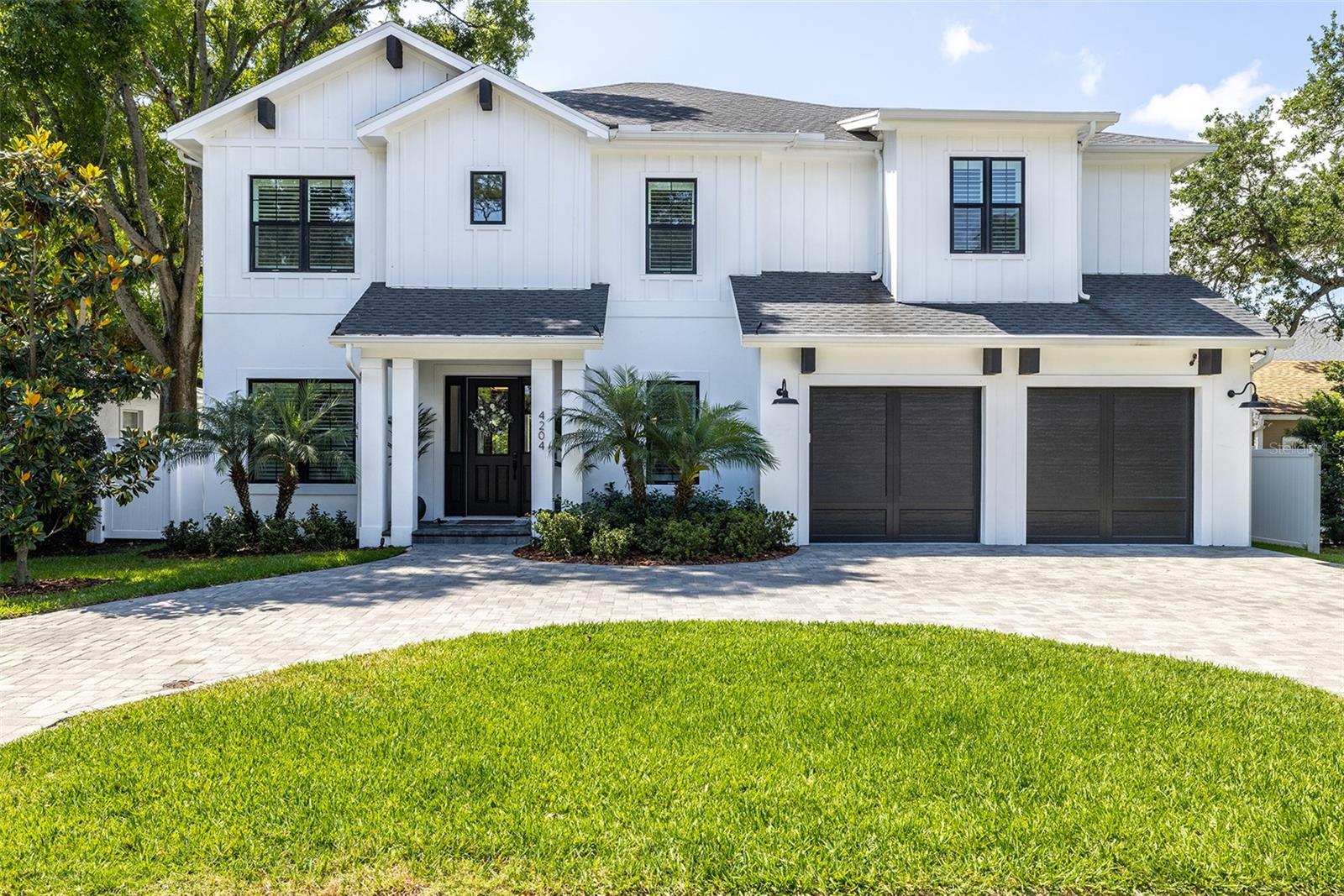 This stunning Modern Farmhouse w/salt-water heated Pool & Outdoor Kitchen, built by TB in 2019 is now available!
2 Story Block, Impact Rated Windows/Doors & Sprayfoam Insulation! Stunning interior package; Wide Plank Oak Flooring throughout (minus full baths & Laundry), Stained Wood Beams in Great Room, Level 4 Smooth Drywall Finish, Solid Core Interior doors, Stained Wood Exterior Ceilings, Modern Wainscoting,upgraded landscaping and exterior lighting. 1st floor holds a large open concept Kitchen w/Custom White Shaker Cabinets stacked to ceiling (Under-Cabinet Lighting), Calacatta Herringbone Backsplash, Pot filler, Viking Appliance Package (Gas Cooking), Concrete Farm Sink, Quartz to mimic Marble w/light & bright Breakfast Nook. Formal Dining Room is accessed through Butler's Pantry (Glass Cabinetry & Wine Fridge + Chef's Pantry) complimented w/modern wainscoting. Study w/glass French doors off of Foyer, Cute Mud-station, Powder Bathroom PLUS 1st floor Guest Suite w/Full Bathroom. Upper floor holds a large Master Suite w/Bianco Carrara clad Bathroom & Custom Built-out Closet. 2 Bedrooms share a Jack N Jill w/Carrara Hexagon tiles, En-Suite Bedroom w/Classic Hexagon design tiles/Beveled Subway Tile all in addition to a well laid out Laundry Room (lowers/uppers/sink/drying rod) and a 20x20 Media/Game-Room, that could also serve as a 6th bedroom.
Mabry, Coleman, Plant. 70X100 lot.